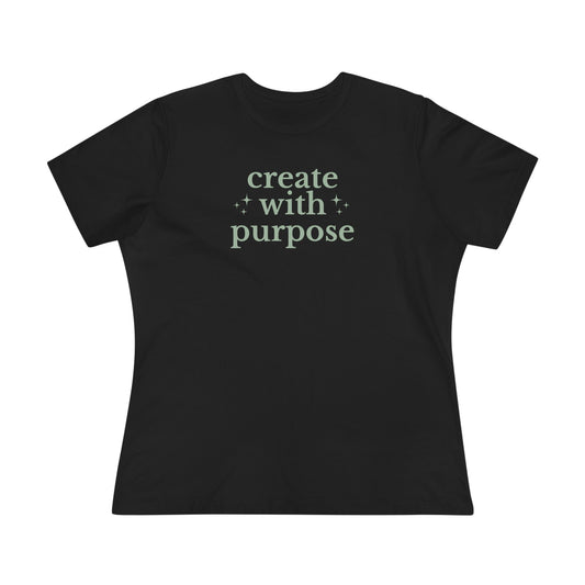 Black t-shirt with 'create with purpose' text on a white background