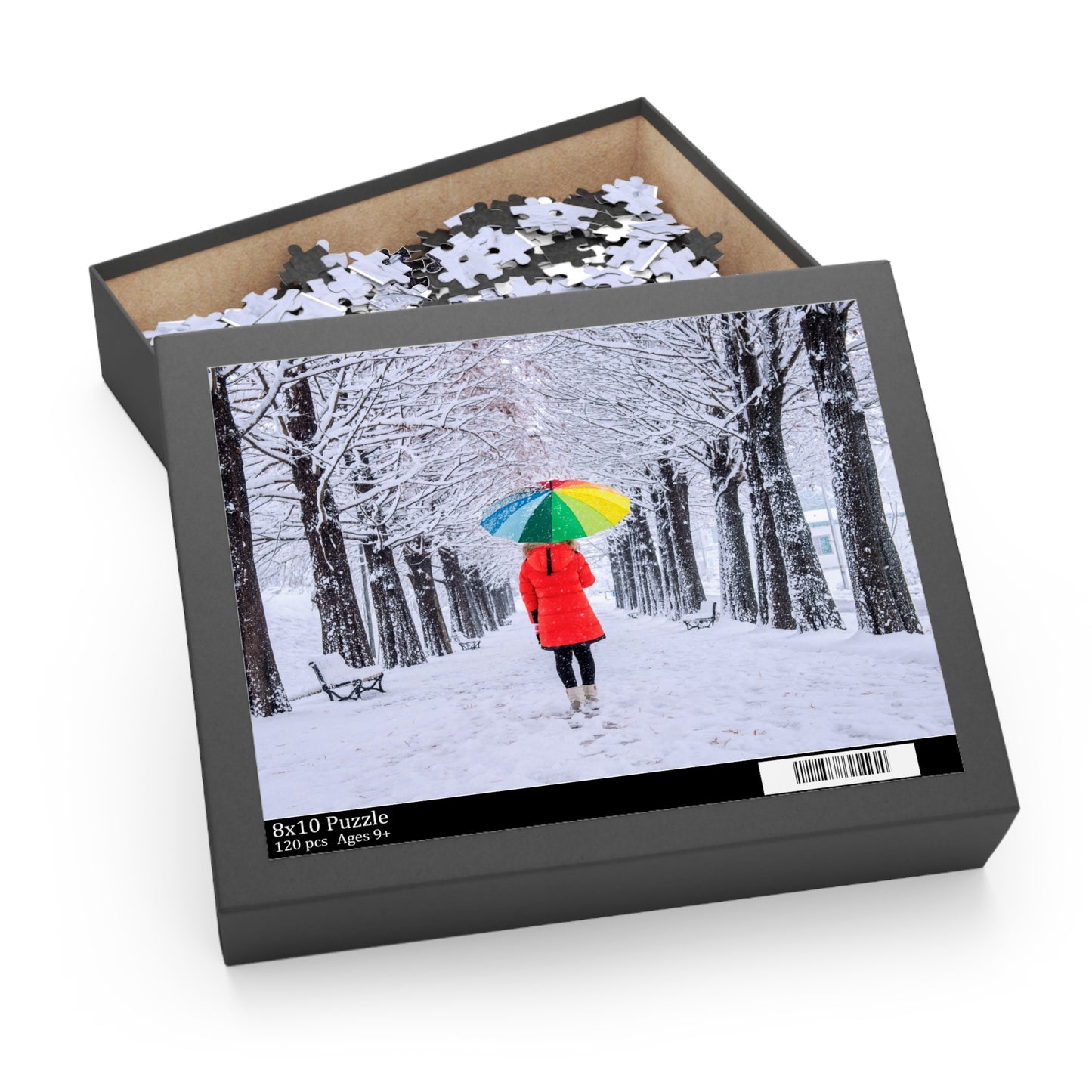 Jigsaw puzzle box with a winter scene design featuring a person in a red coat and colorful umbrella.