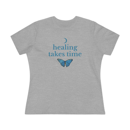 Gray t-shirt with 'healing takes time' blue text and butterfly graphic on a white background
