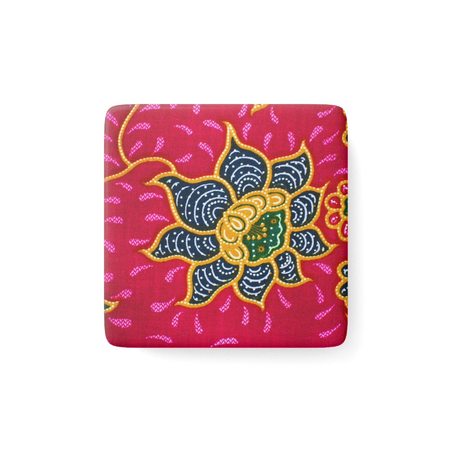 Square magnet with a black flower lined in gold against a red background