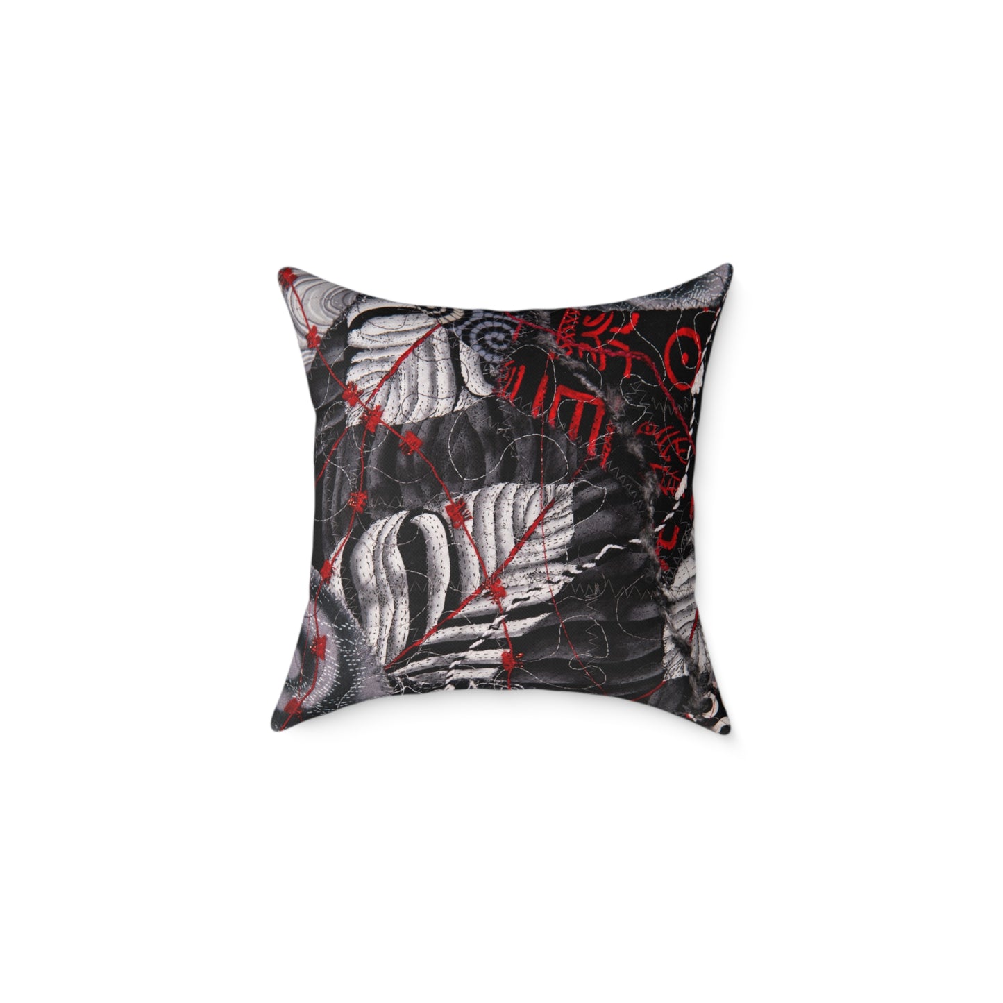 Decorative pillow with black, white, and red leaf pattern 