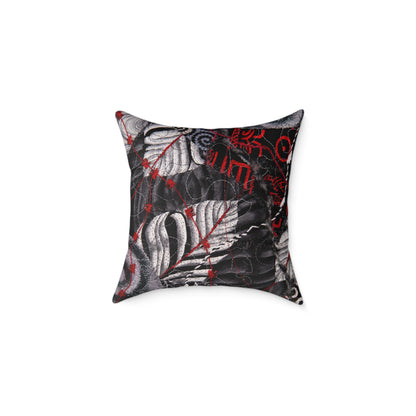 Decorative pillow with black, white, and red leaf pattern 