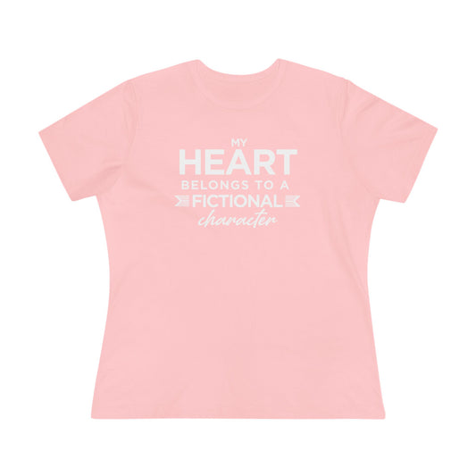 Pink t-shirt with white text 'My heart belongs to a fictional character' 