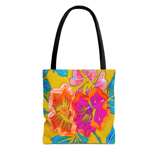Tote bag with colorful floral design on a yellow background