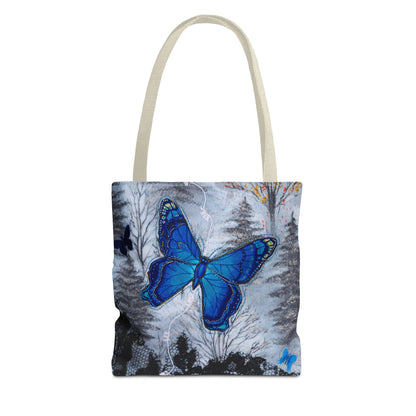 Tote bag with a blue butterfly design and cream handle on a white background